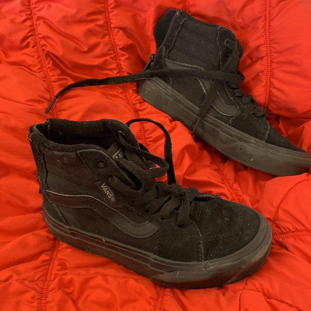 Black Vans booties. Used by a 3 year-old child.